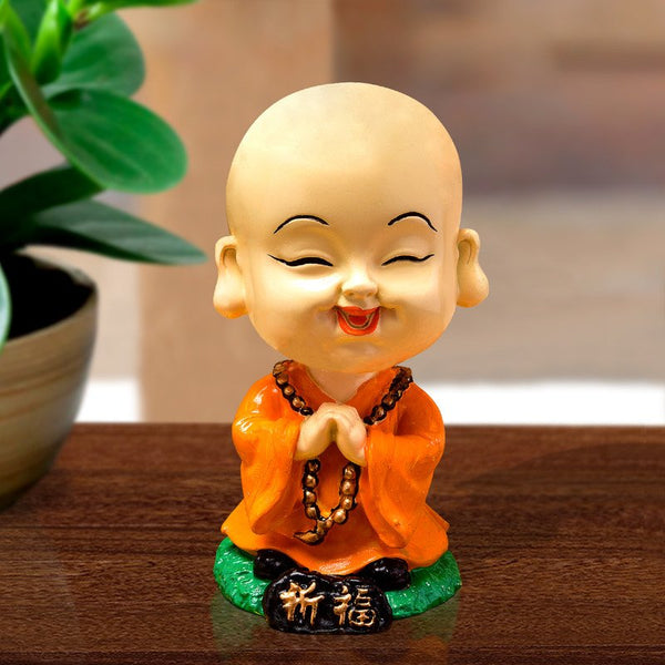 Handcrafted Ployresin Lord Buddha Praying Statue  Showpiece Home Decor/Office Decor/Spiritual Gift, Orange Colour - Karigaari India Aesthetic Home Decor