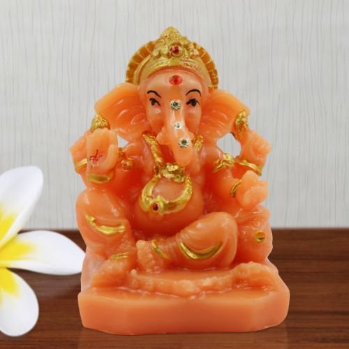 Small Lord Ganesha Wearing ornaments And Sitting Orange Colour Idol for Home Decor