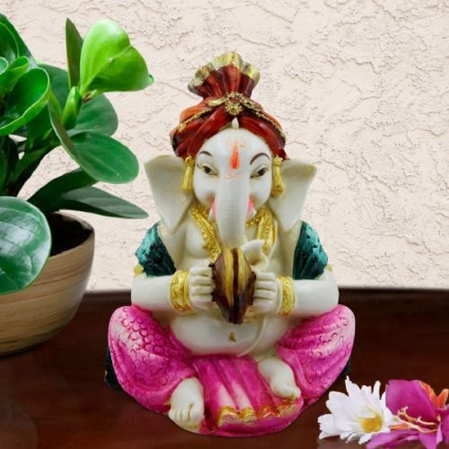 Lord Ganesha Playing Instrument wearing Pink Dhoti Idol for Home Decor - Karigaari India Aesthetic Home Decor