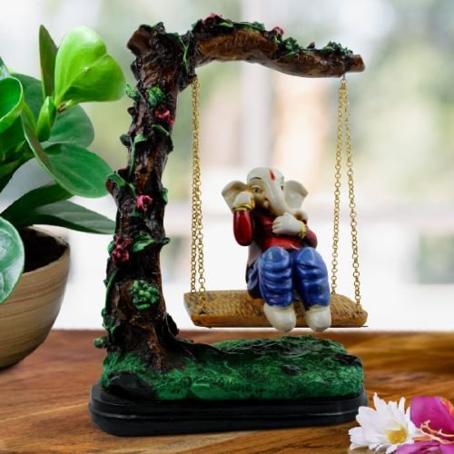 Lord Ganesha Sitting on Jhula Under Tree Multicolor Idol for Home Decor - Karigaari India Aesthetic Home Decor