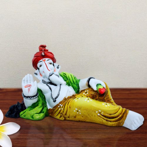 Lord Ganesha Sleeping Wearing Yellow Dhoti Idol for Home Decor - Karigaari India Aesthetic Home Decor