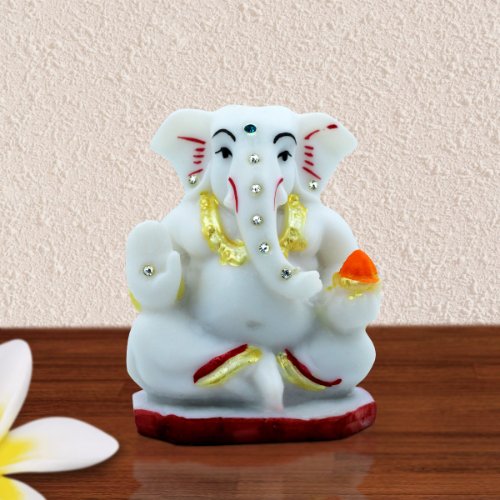 Small Lord Ganesha Sitting With Holding Red Modak in Hand White Color Idol for Home Decor