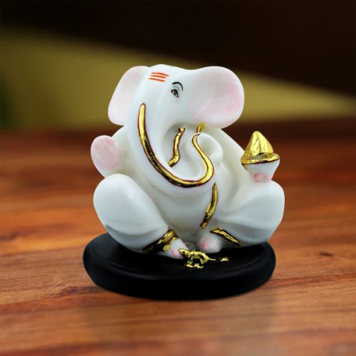 Small Lord Ganesha Sitting With Holding Golden Modak in Hand White Color Idol for Home Decor