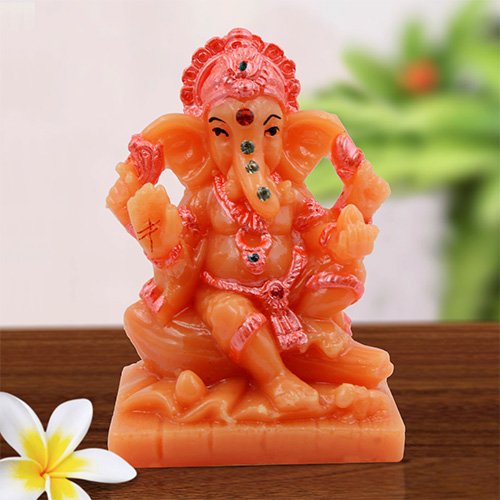 Small Lord Ganesha Sitting On Rock Idol Orange And Pink Ornaments Best for Home Decor - Karigaari India Aesthetic Home Decor