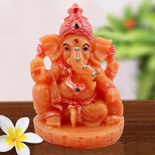 Unique Lord Ganesha Sitting With One Leg Down Idol Orange Color And Pink Ornaments Best for Home Decor