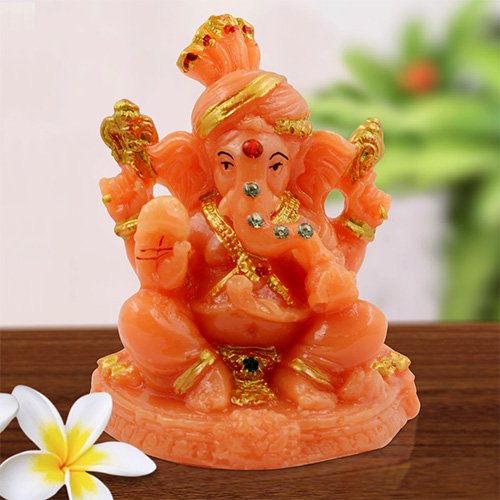 Unique Little Lord Ganesha Sitting With One Leg Up Idol Orange Color And Golden Ornaments Best for Home Decor