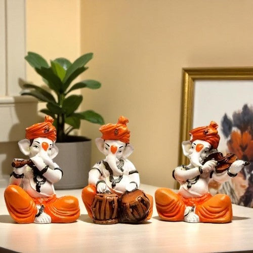 Unique Little Three Lord Ganesha Playing Instruments Idol Orange Best for Home Decor - Karigaari India Aesthetic Home Decor