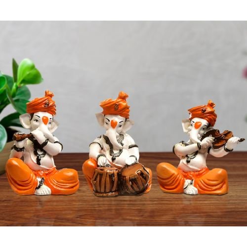Unique Three Lord Ganesha Playing Instruments Idol Orange Best for Home Decor - Karigaari India Aesthetic Home Decor