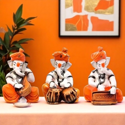 Unique Design Three Little Lord Ganesha Playing Instruments Idol Orange Best Item for Home Decor - Karigaari India Aesthetic Home Decor