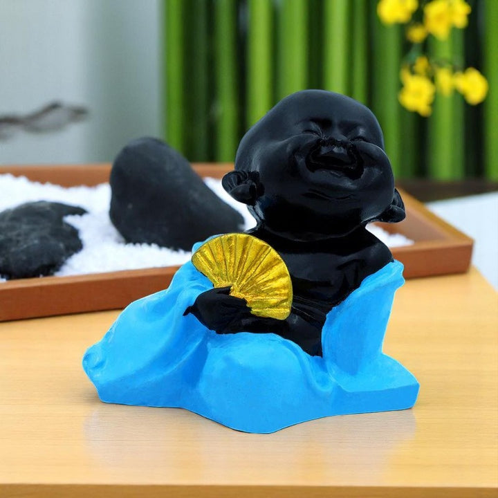 Handcrafted Ployresin Lord Buddha Sitting With Hand Fan Statue Showpiece Home Decor/Office Decor/Spiritual Gift, Black And Blue - Karigaari India Aesthetic Home Decor