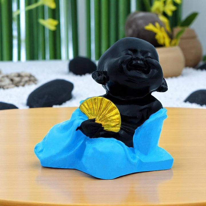 Handcrafted Ployresin Lord Buddha Sitting With Hand Fan Statue Showpiece Home Decor/Office Decor/Spiritual Gift, Black And Blue - Karigaari India Aesthetic Home Decor