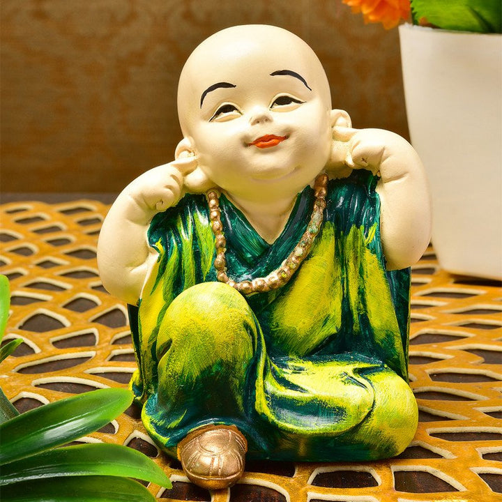 Handcrafted Ployresin Lord Buddha Statue Sitting Putting Fingers In Ears Light Green Colour  Showpiece Home Decor/Office Decor/Spiritual Gift - Karigaari India Aesthetic Home Decor