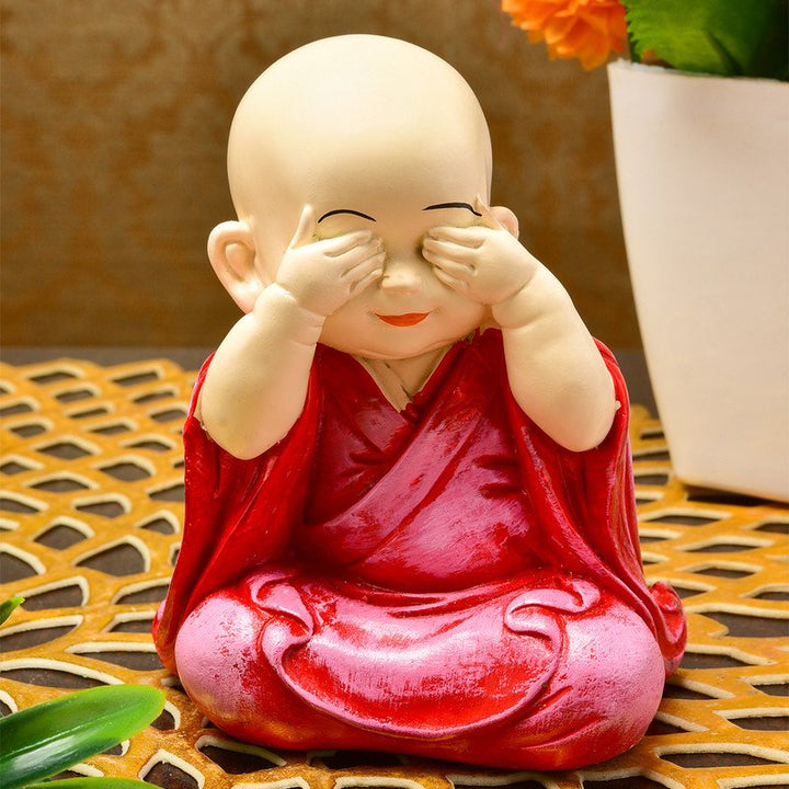 Handcrafted Ployresin Lord Buddha Sitting Statue Putting Fingers On Eyes Showpiece Home Decor/Office Decor/Spiritual Gift, Pink Colour - Karigaari India Aesthetic Home Decor