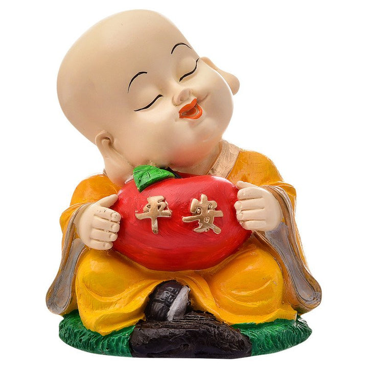 Handcrafted Ployresin Lord Buddha Orange Colour Sitting With Taking Apple In Hand Statue  Showpiece Home Decor/Office Decor/Spiritual Gift - Karigaari India Aesthetic Home Decor