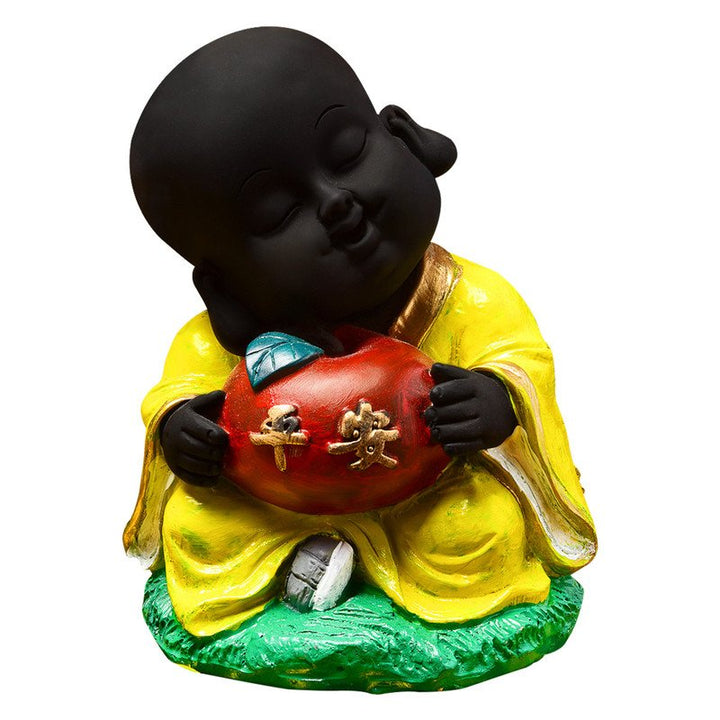 Handcrafted Ployresin Sitting With Taking Apple In Hand Lord Buddha Statue Showpiece Home Decor/Office Decor/Spiritual Gift, Yellow Colour - Karigaari India Aesthetic Home Decor