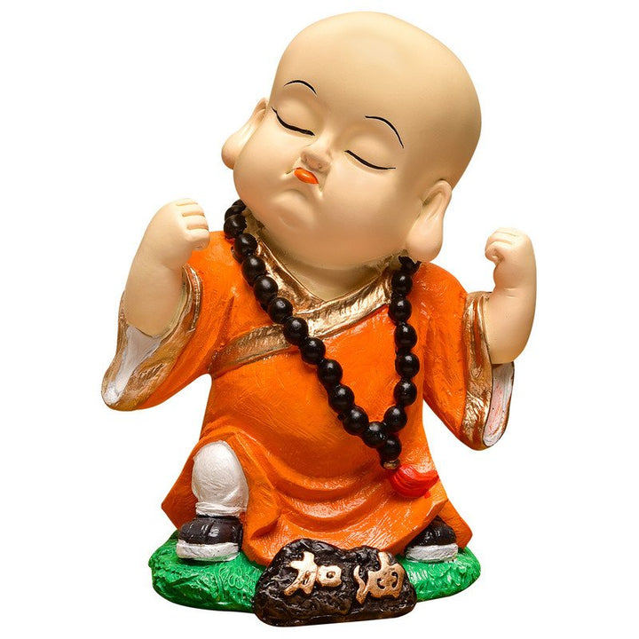 Handcrafted Ployresin Standing And Making Fist Of Fingers Lord Buddha Orange Colour Statue Showpiece Home Decor/Office Decor/Spiritual Gift - Karigaari India Aesthetic Home Decor