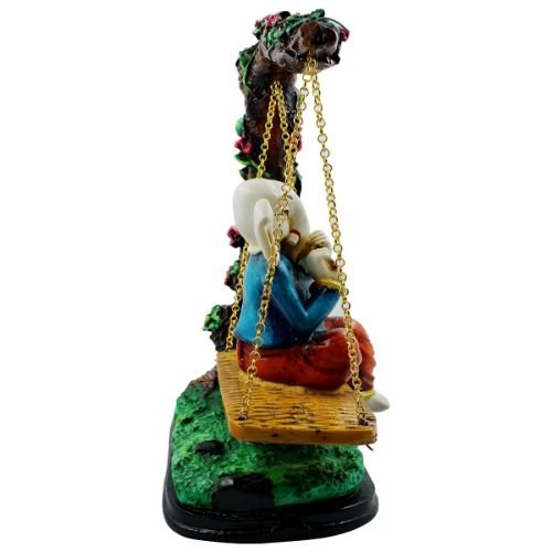 Lord Ganesha Sitting on Jhula Playing Flute Idol for Home Decor - Karigaari India Aesthetic Home Decor