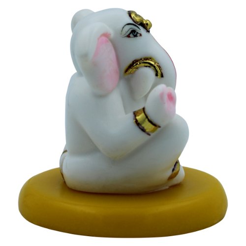 Lord Ganesha Sitting Idol With Holding Golden Modak Best for Home Decor - Karigaari India Aesthetic Home Decor