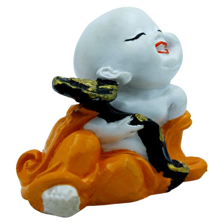 Handcrafted Ployresin Lord Buddha Sitting With Snake With Cute  Smile Statue Showpiece Home Decor/Office Decor/Spiritual Gift, White And Orange - Karigaari India Aesthetic Home Decor