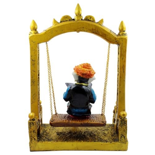 Lord Ganesha Sitting on Jhula Reading newspaper Idol for Home Decor - Karigaari India Aesthetic Home Decor