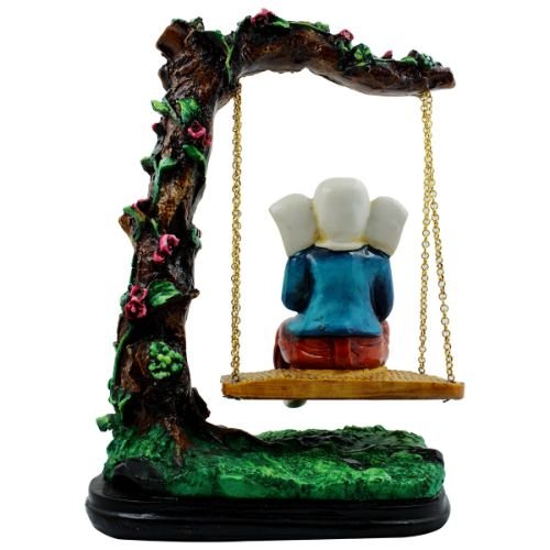Lord Ganesha Sitting on Jhula Playing Flute Idol for Home Decor - Karigaari India Aesthetic Home Decor