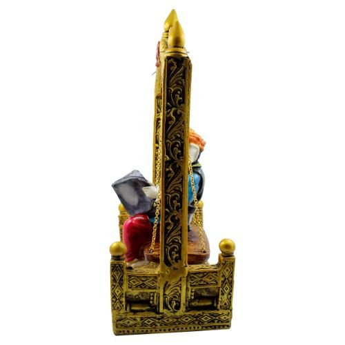 Lord Ganesha Sitting on Jhula Reading newspaper Idol for Home Decor - Karigaari India Aesthetic Home Decor
