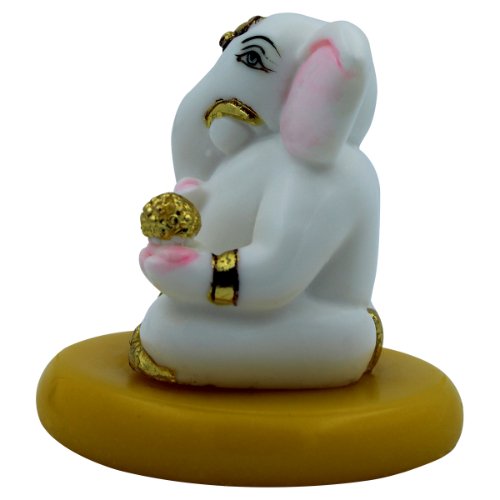 Lord Ganesha Sitting Idol With Holding Golden Modak Best for Home Decor - Karigaari India Aesthetic Home Decor