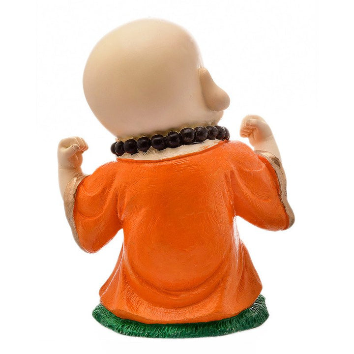 Handcrafted Ployresin Standing And Making Fist Of Fingers Lord Buddha Orange Colour Statue Showpiece Home Decor/Office Decor/Spiritual Gift - Karigaari India Aesthetic Home Decor