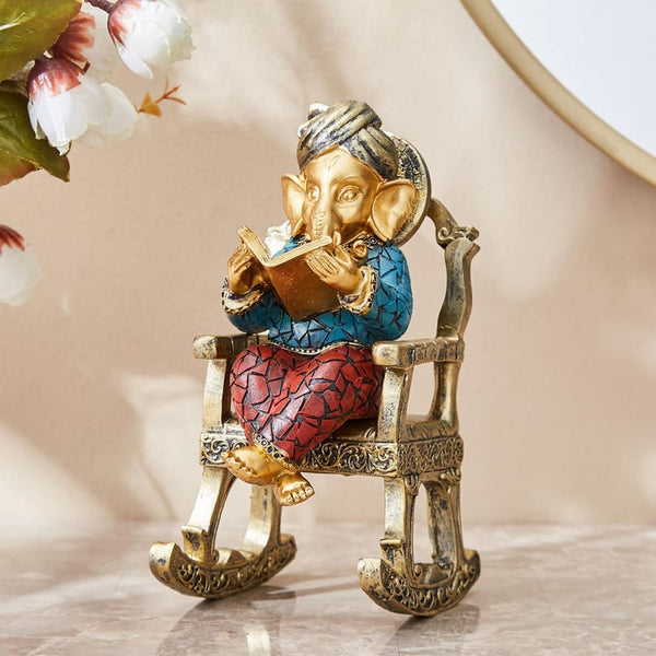 Intellectual Lord Ganesha Statue Reading Book on Rocking Chair | Scholarly Ganesh Idol for Wisdom, Knowledge & Good Fortune | Unique Polyresin Home Decor & Spiritual Gift