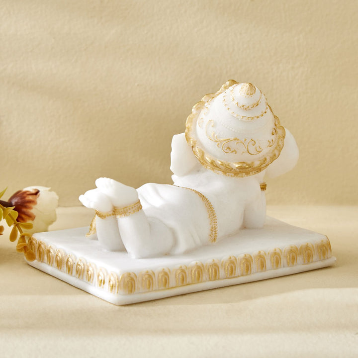 Reading Ganpati Idol White & Gold Resin Ganesha Statue for Home Decor & Gifting - Karigaari India Aesthetic Home Decor