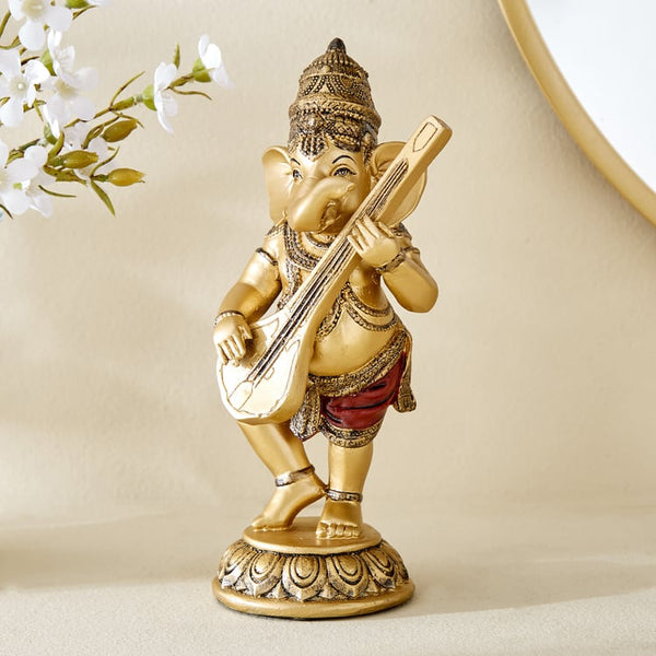 Divine Musical Lord Ganesha Statue with Sitar-like Instrument  | Premium Golden Polyresin Idol for Artistic Prosperity, Joyful Blessings & Inspiring Home Decor Gift