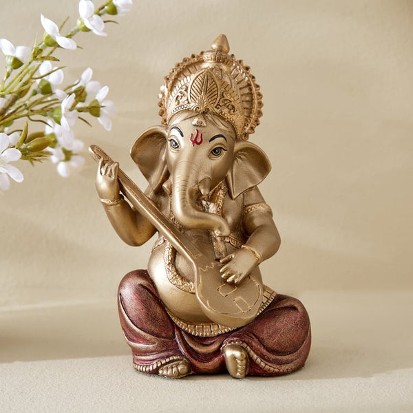 Divine Seated Lord Ganesha Statue PlayingSitar  | Premium Golden Polyresin Idol for Artistic Prosperity, Wisdom, Learning & Inspiring Home Decor Gift