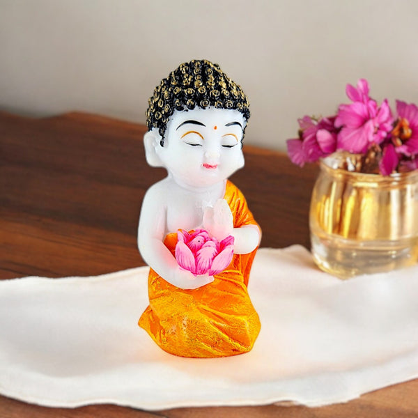 Resin Meditating Baby Buddha Idol with Pink Lotus Flower | Spiritual Buddha Statue for Home Decor, Meditation, and Gifting | Yellow Robe Figurine for Peace & Positivity