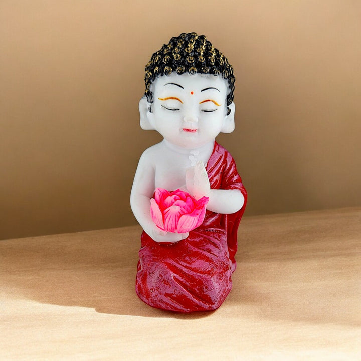 Resin Baby Buddha Idol Holding Pink Lotus Flower | Meditating Buddha Statue in Red Robe for Home Decor, Spiritual Corners & Gift Purposes | Vastu & Feng Shui Showpiece - Karigaari India Aesthetic Home Decor