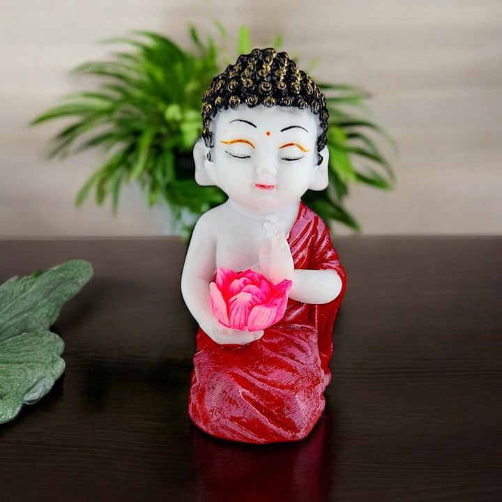 Resin Baby Buddha Idol Holding Pink Lotus Flower | Meditating Buddha Statue in Red Robe for Home Decor, Spiritual Corners & Gift Purposes | Vastu & Feng Shui Showpiece - Karigaari India Aesthetic Home Decor