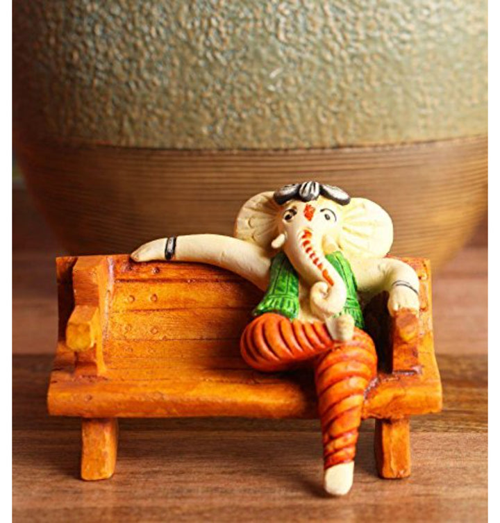 Leisurely Ganesha Seated: Handcrafted Resin Statue - Peace & Contemplation - Karigaari India Aesthetic Home Decor
