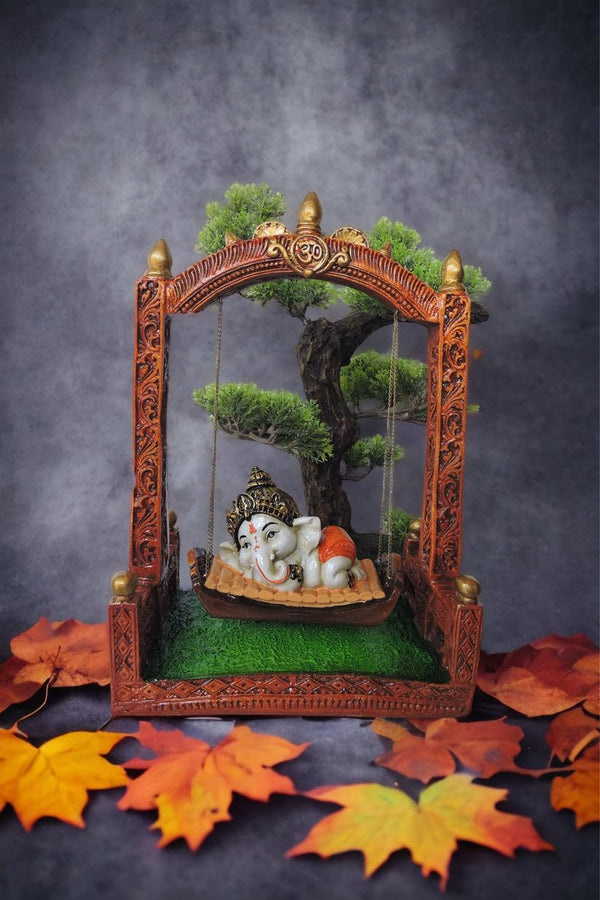 Ganesha on Swing Showpiece – Resin Decorative Idol with Tree & Frame for Home Decor & Gifting
