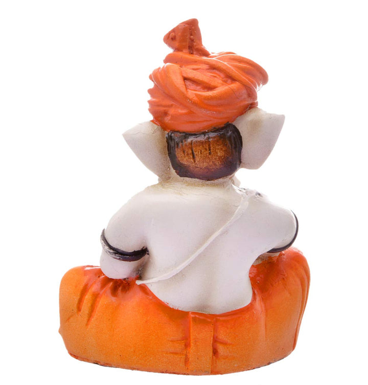 Resin Ganesha Playing Tabla - Symbol of Music & Auspiciousness - Karigaari India Aesthetic Home Decor