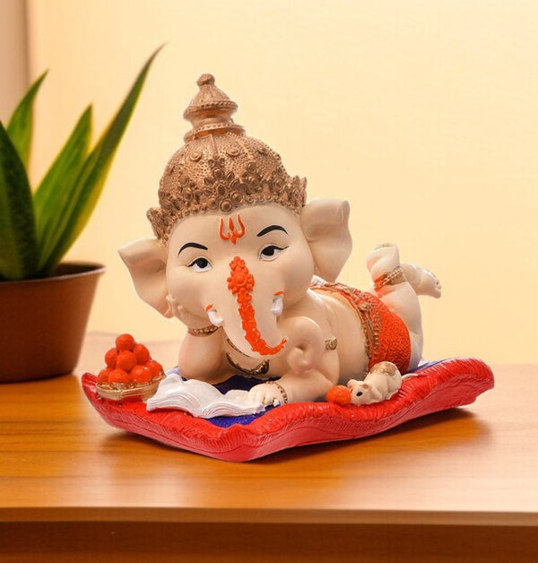 Resin Ganesha Lounging on Cushion - Symbol of Comfort & Blessings - Karigaari India Aesthetic Home Decor