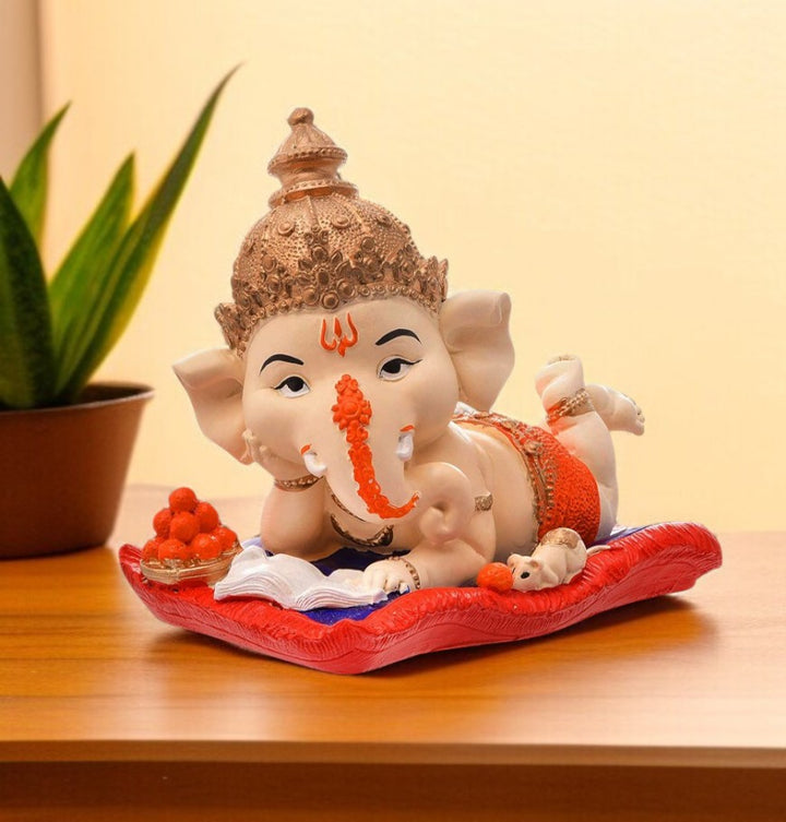 Resin Ganesha Lounging on Cushion - Symbol of Comfort & Blessings - Karigaari India Aesthetic Home Decor