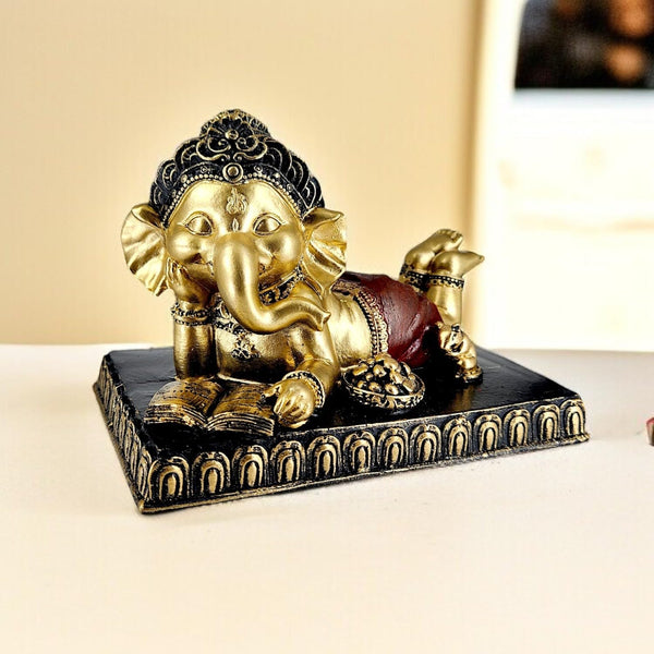 Reclining Ganesha Idol with Book – Resin Decorative Statue for Home, Study & Gifting