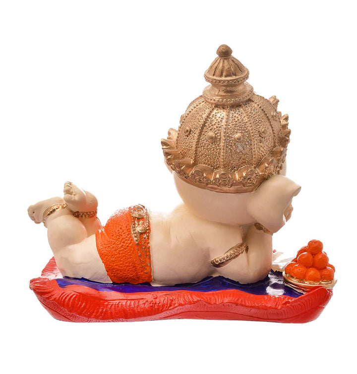Resin Ganesha Lounging on Cushion - Symbol of Comfort & Blessings - Karigaari India Aesthetic Home Decor