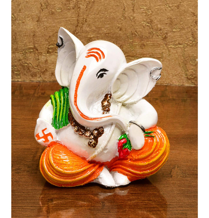 Peaceful Ganesha Seated: Handcrafted Resin Statue - Comfort & New Beginnings - Karigaari India Aesthetic Home Decor