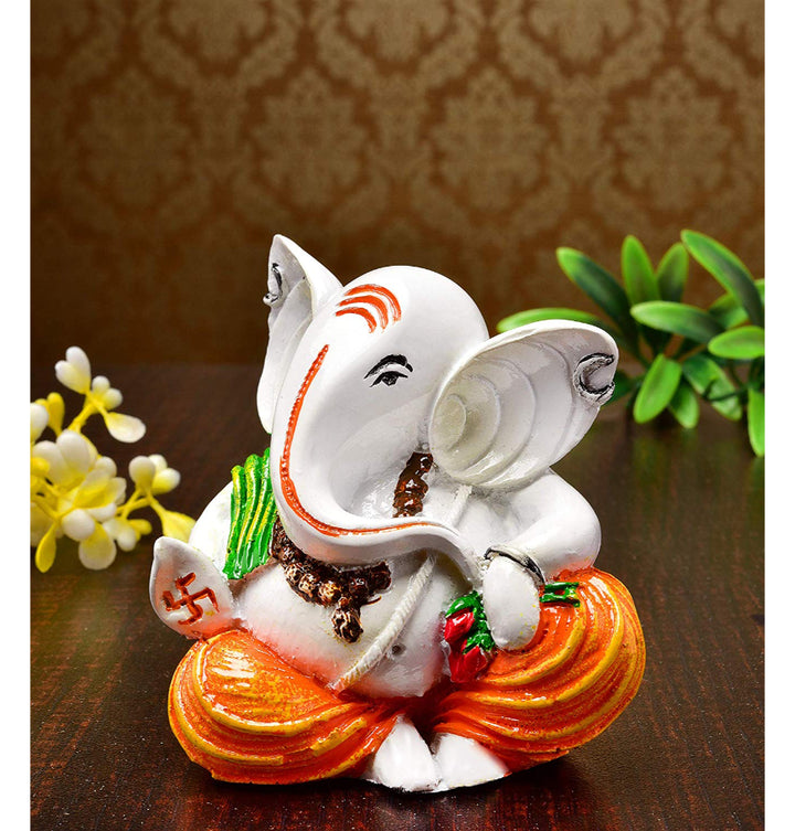 Peaceful Ganesha Seated: Handcrafted Resin Statue - Comfort & New Beginnings - Karigaari India Aesthetic Home Decor