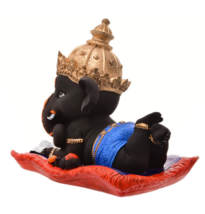Peaceful Repose Ganesha: Intricately Crafted Resin Reclining Idol with Offerings - Spiritual & Serene - Karigaari India Aesthetic Home Decor