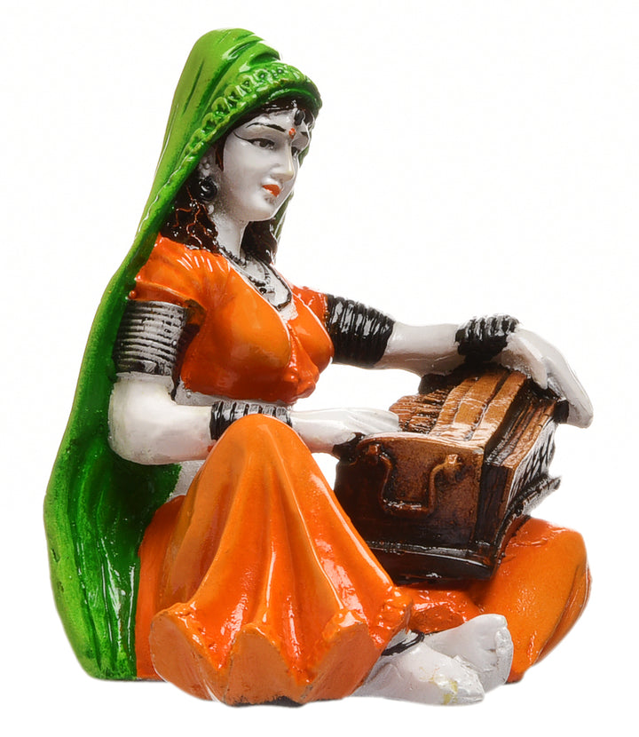 Musical Heritage Figurine: Hand-Painted Resin Rajasthani Lady Playing Instrument - Karigaari India Aesthetic Home Decor