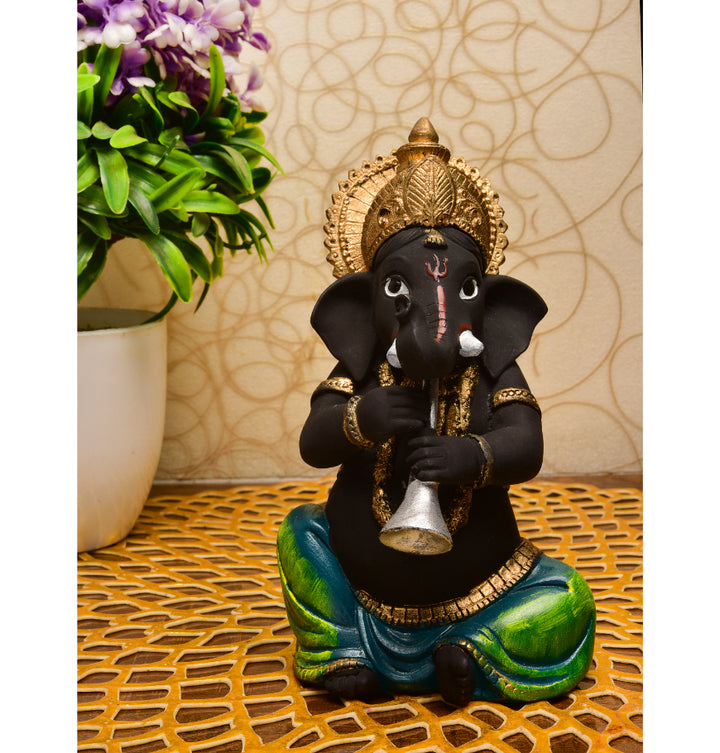 Resin Ganesha with Shehnai: Auspicious Idol for Positive Vibes & Musical Charm - Karigaari India Aesthetic Home Decor