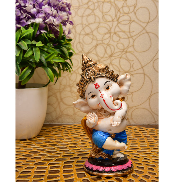 Joyful Dancer Ganesha: Handcrafted Resin Statue on Pedestal - Blessings & Celebration - Karigaari India Aesthetic Home Decor