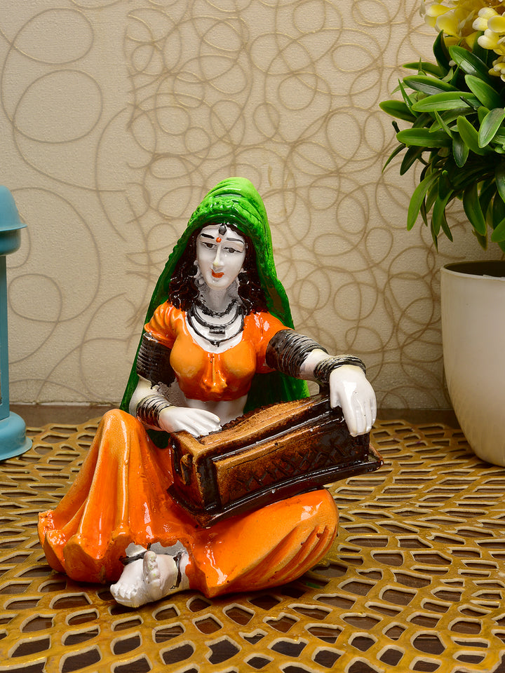 Musical Heritage Figurine: Hand-Painted Resin Rajasthani Lady Playing Instrument - Karigaari India Aesthetic Home Decor