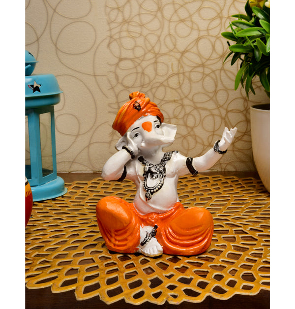 Lord Ganesha's Song: Unique Resin Singing Idol for Home, Pooja & Festivities